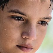 young boy sweating